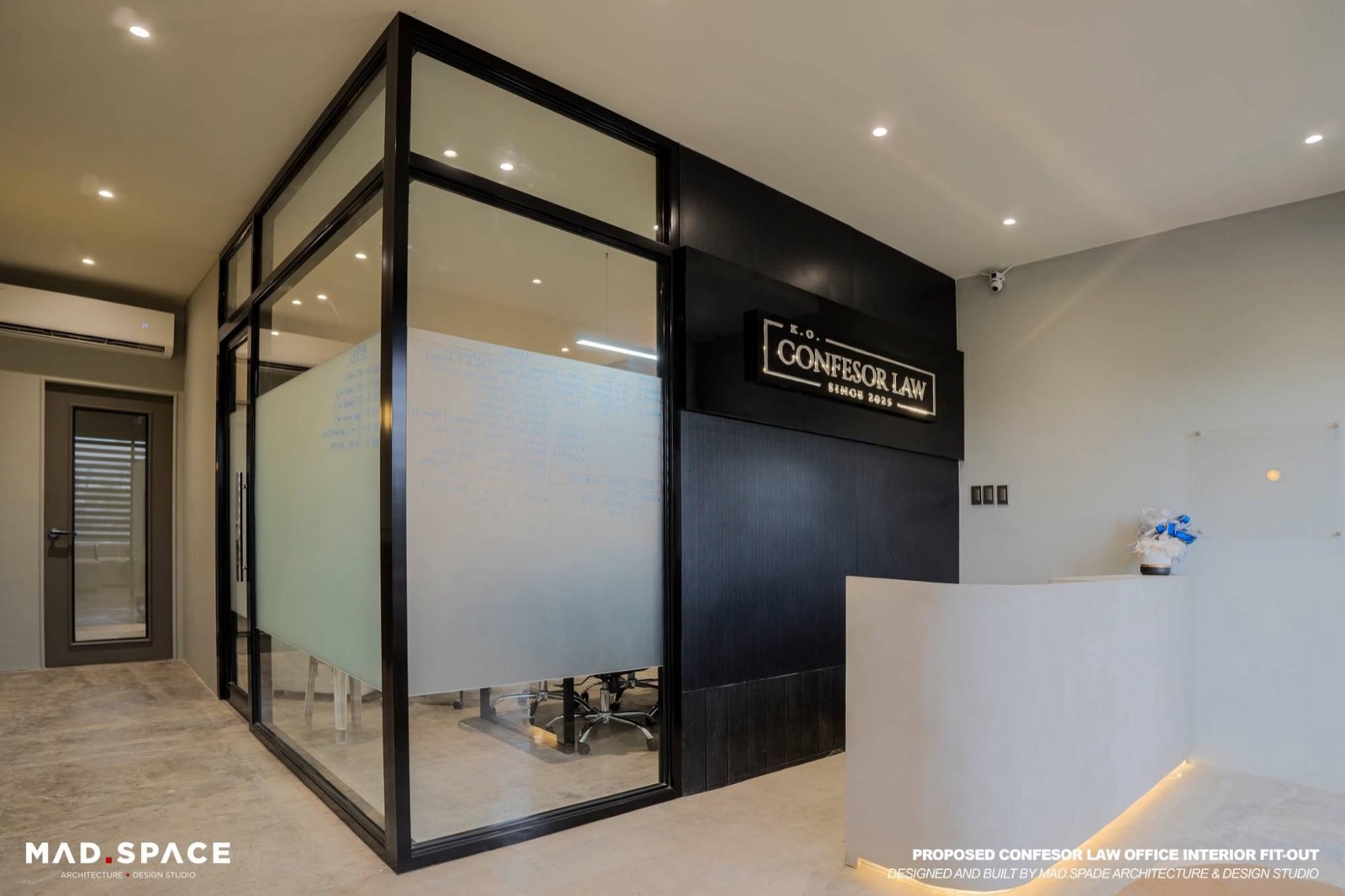 Reception area with the K.G. Confesor Law sign