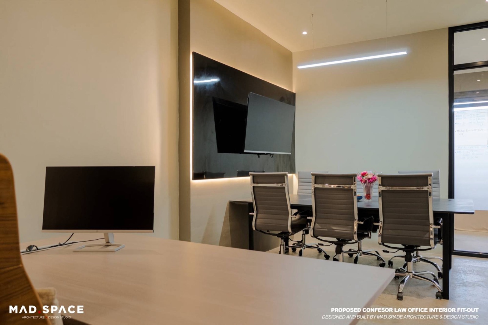 Conference room with a work desk in front